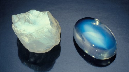 Moonstone - rough and cabbed. Cabochon is approximately 5 ct. The beautiful shimmer of light that's characteristic of moonstone is apparent even in its rough form. This special property is maximized by a quality cut. - David Humphrey