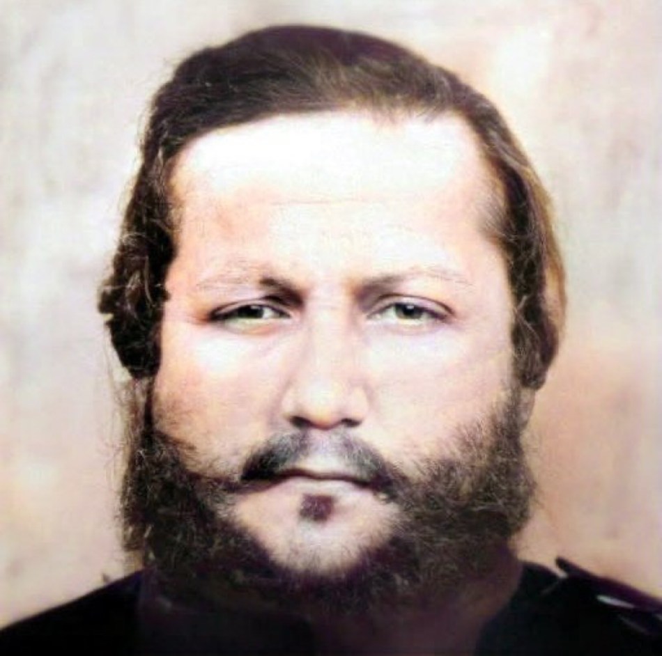 A colourized close-up of the face of FS López from the photo on the right.